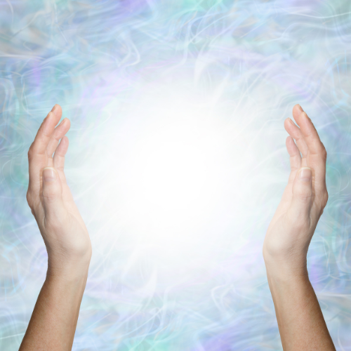 2 mains autour d'une boule de lumiere pour une seance psycho energetique
